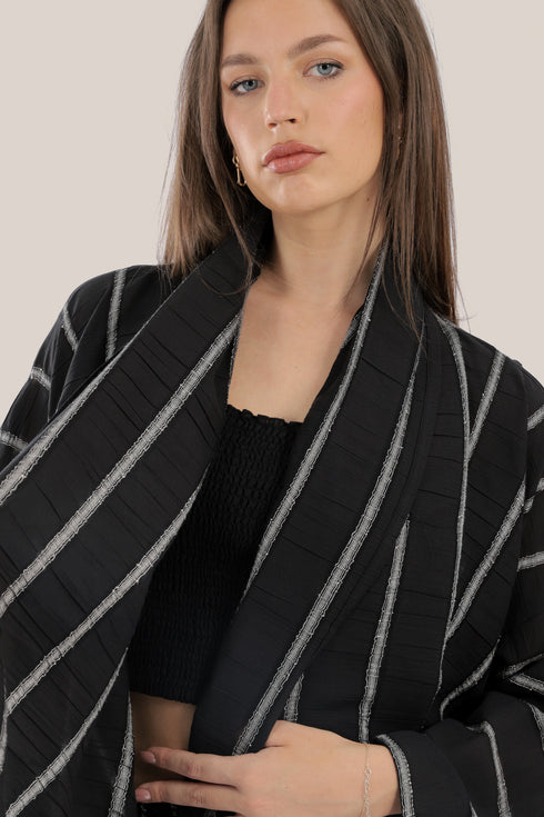 Striped coat with draped collar and long sleeves